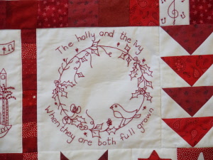 1i christmas carols quilt close up